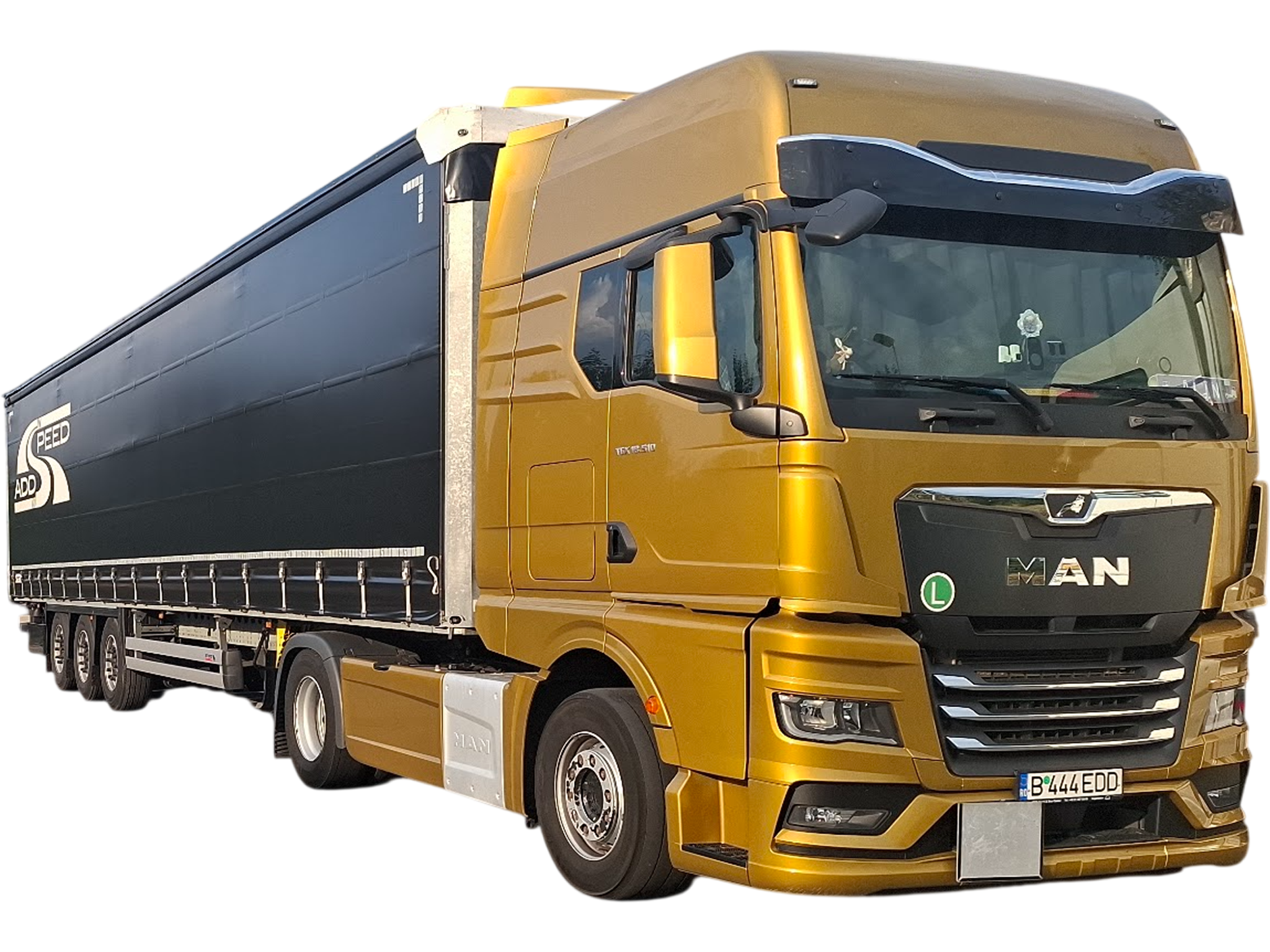 Un ansamblu cap tractor MAN si semiremorca Schmitz cu prelata ce apartin flotei de transport ADD SPEED